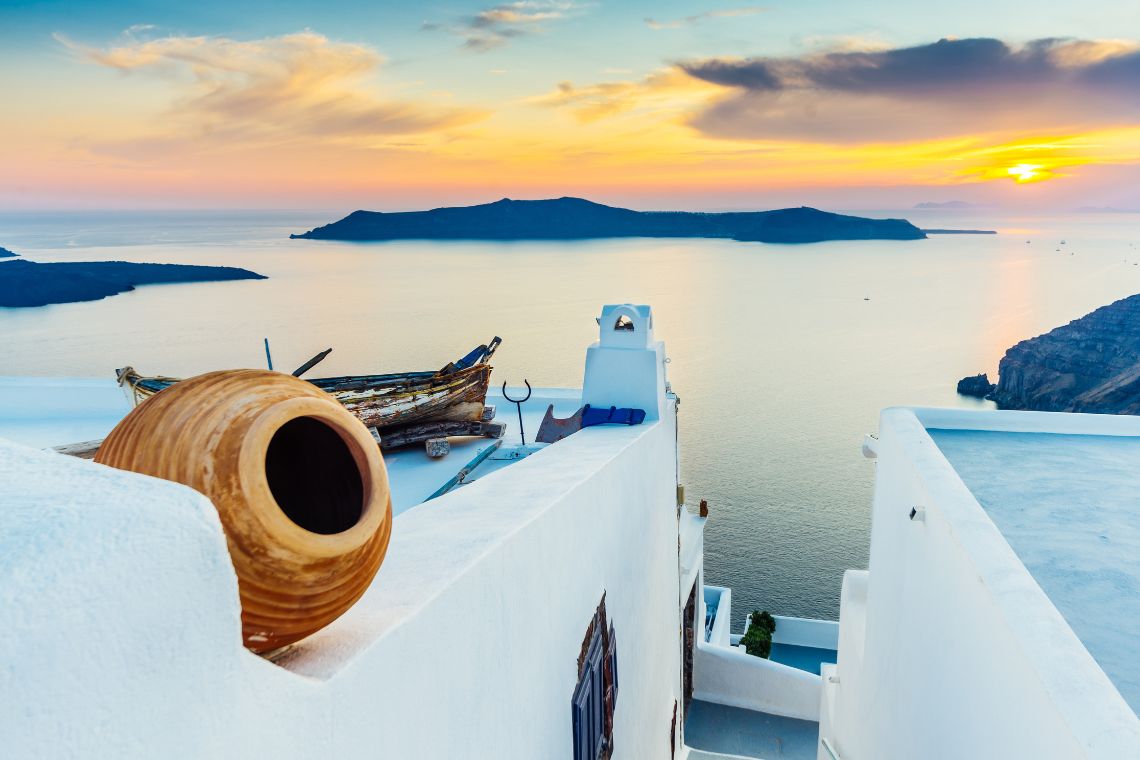 santorini volcano caldera view and sunset canva by aetherial